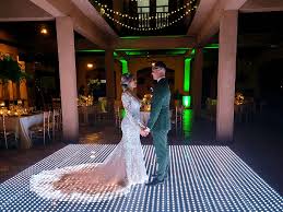 Couple Standing On LED Floor